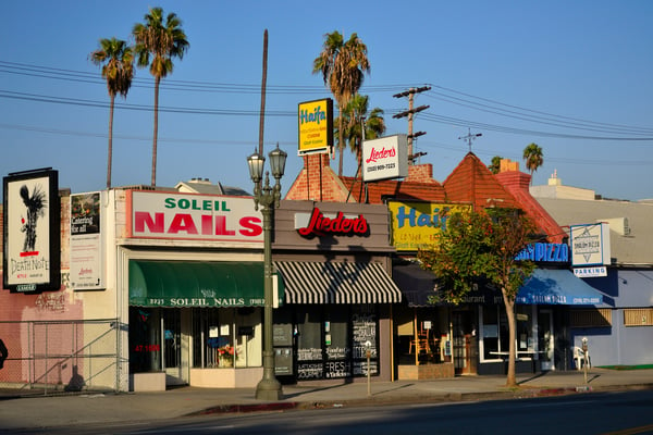 Storefronts on a busy street in Los Angeles California